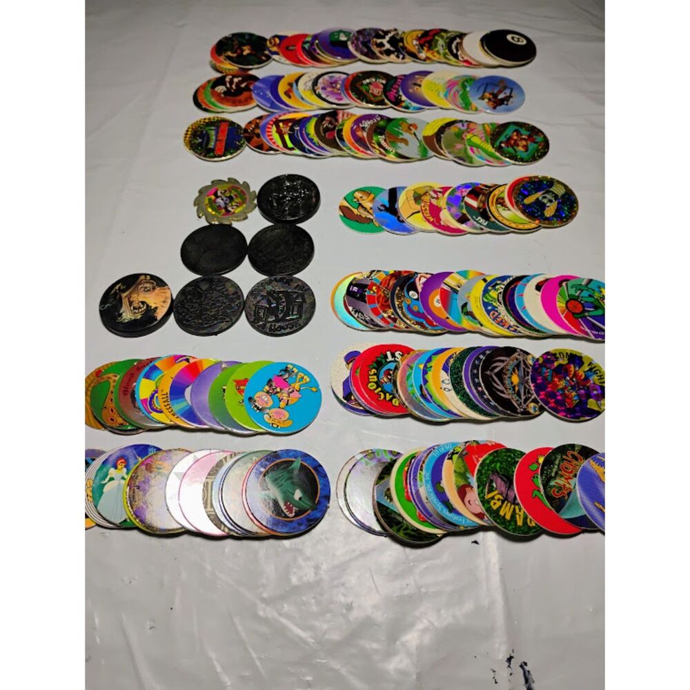 Lot of Over 160 Assorted Pogs With Round Carrying Case